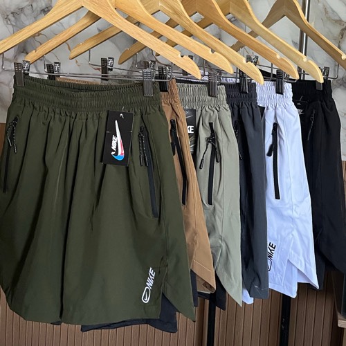 Short Nike com compressão/bolsos internos e externos